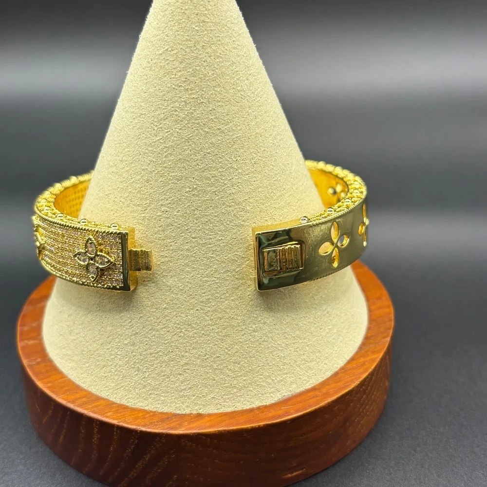 Gold Tone Crystal Pave Floral Quatrefoil Hinged Bangle Bracelet 6.75 Inch